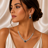 Woman wearing a necklace and earrings