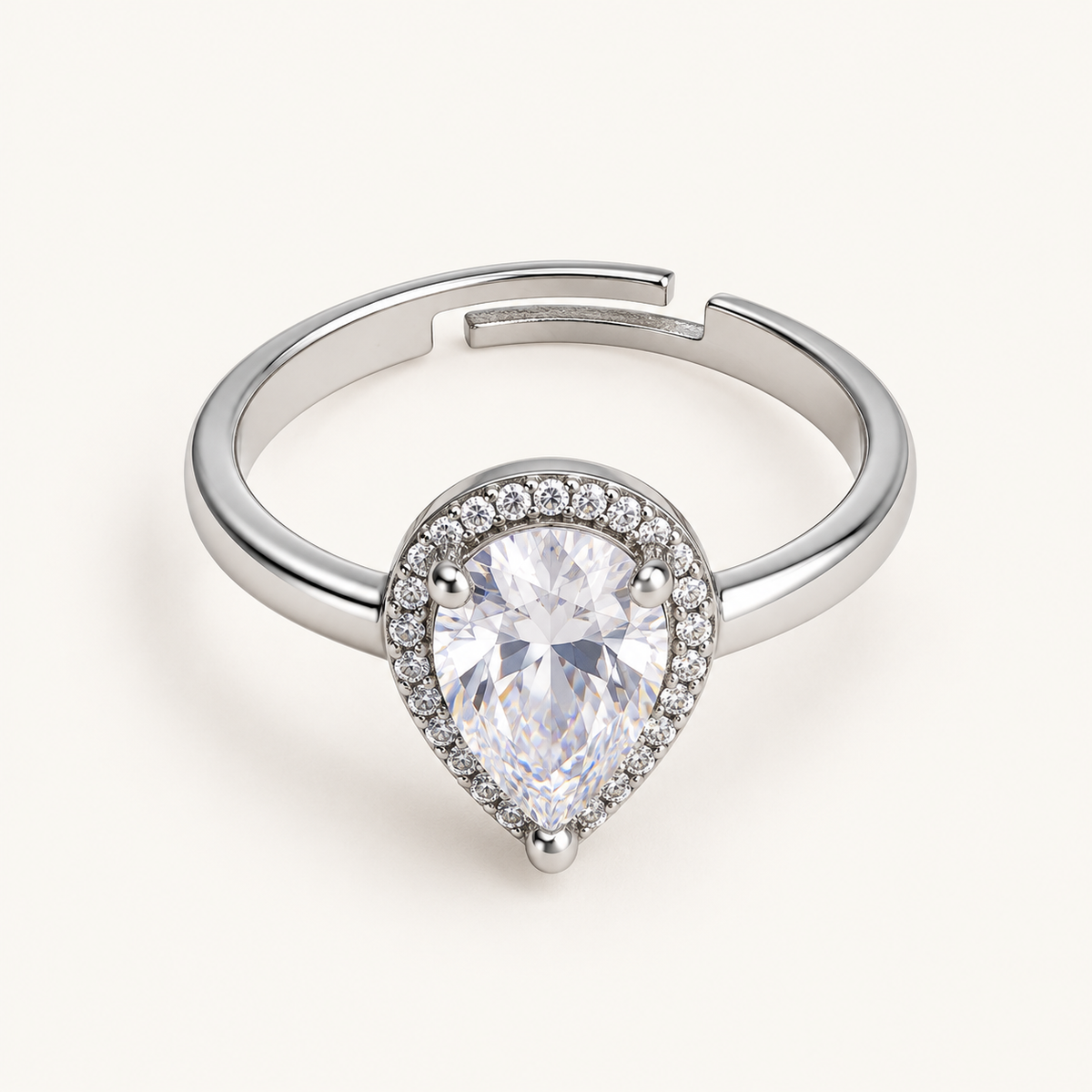 Tehreer Jewels Elegant Pear Cut Halo Ring – Silver Tone Adjustable Crystal Ring